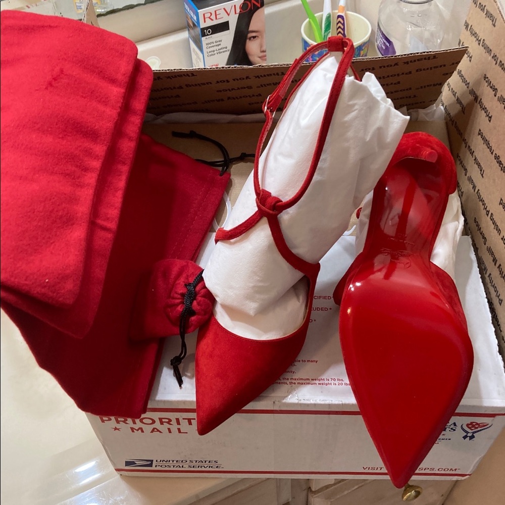 Christian Louboutin Red Bottom Heels.
